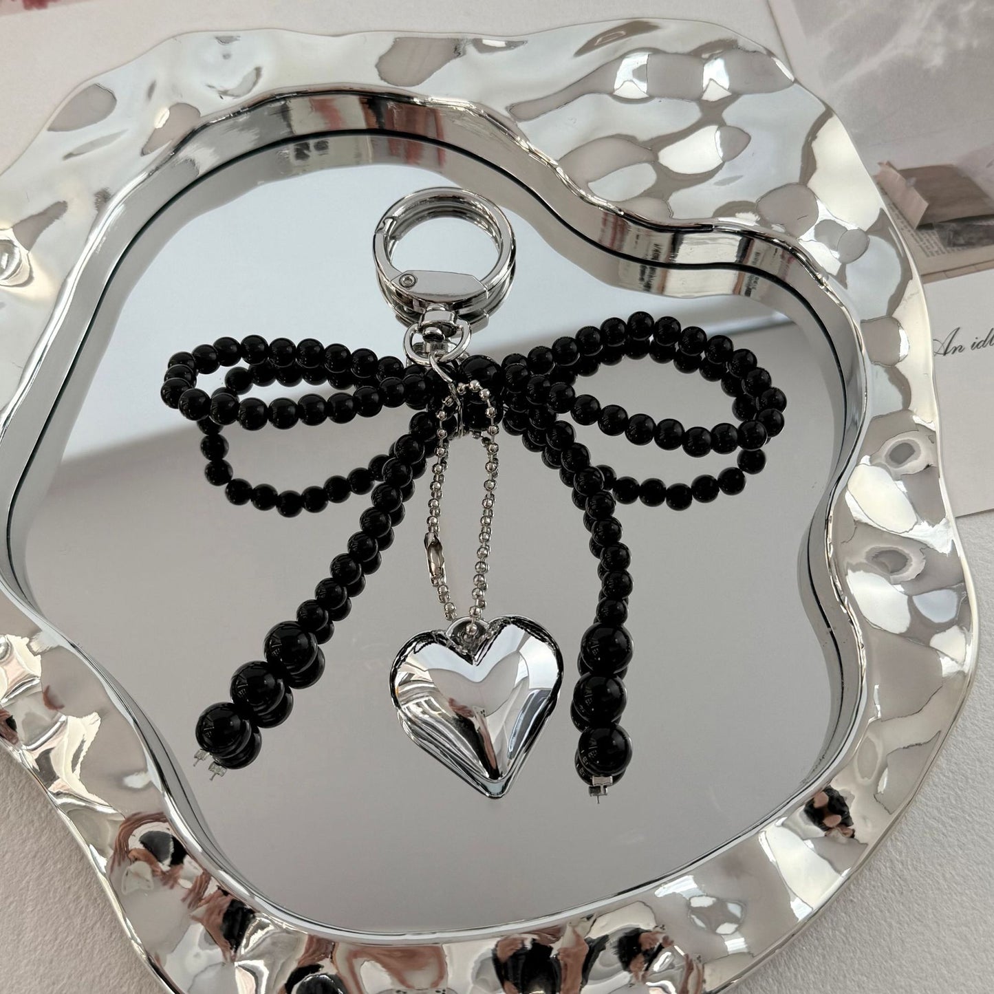 Eleganter Perlencharms-Schlüsselanhänger Brehn
