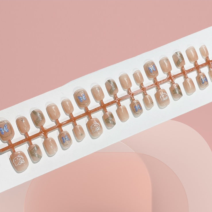 Künstlerisches Press-On-Nagelset mit Schmetterlings- und Metallic-Design Brehn