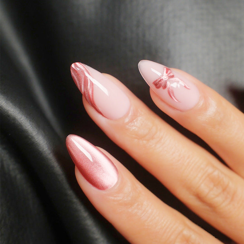 Dekorative Stiletto Press-On Nägel mit Schleifenakzenten Brehn