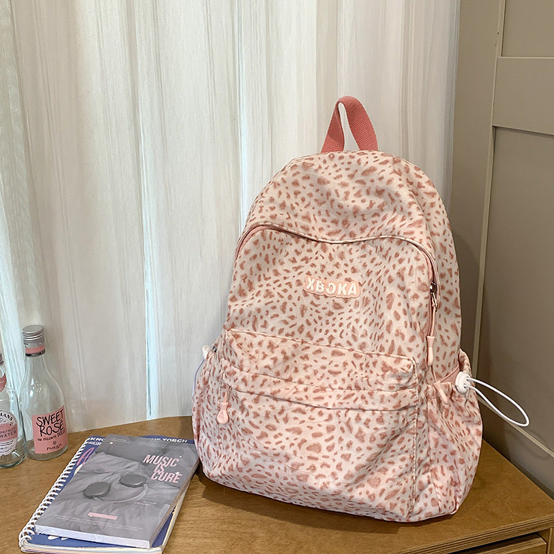 Niedlicher dekorativer trendiger Schulrucksack