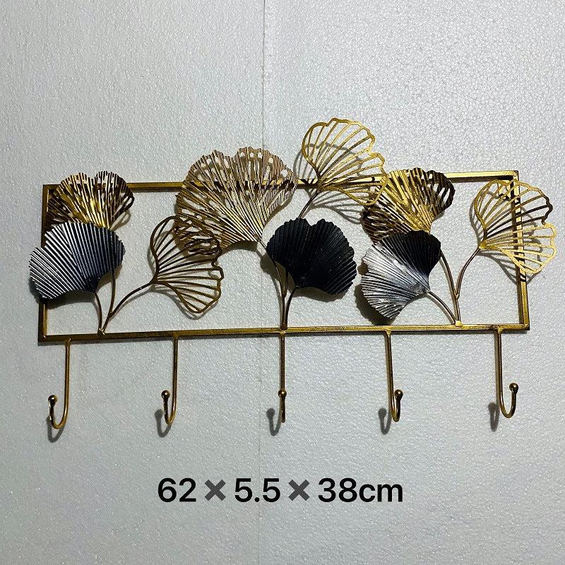 Dekorativer Metall Wandhakenregal mit Ginkgo-Blatt-Design Brehn
