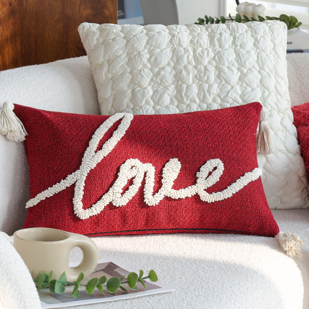 Dekoratives Kissen mit Liebe Motiv