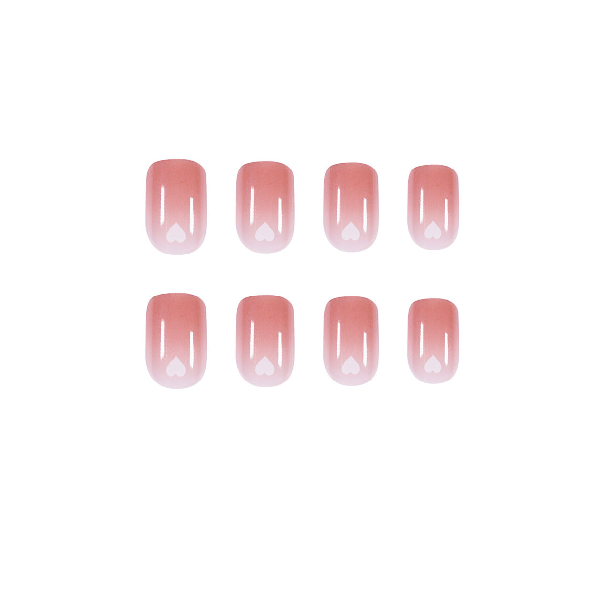 Kunstvolle Nagelkunst mit herzförmigen Akzenten und sanftem Ombre-Effekt Brehn