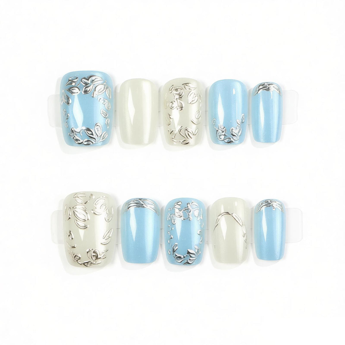 Dekoratives Press-On Nail Art Set mit floralen und metallischen Akzenten Brehn