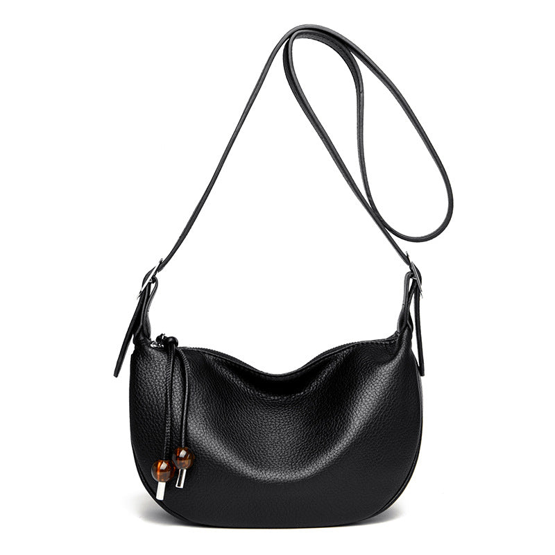 Lässige strukturierte Leder-Slingtasche Brehn