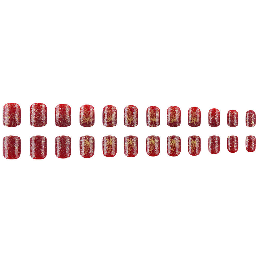 Künstlerisches mit Blättern verziertes Nageldesign Brehn