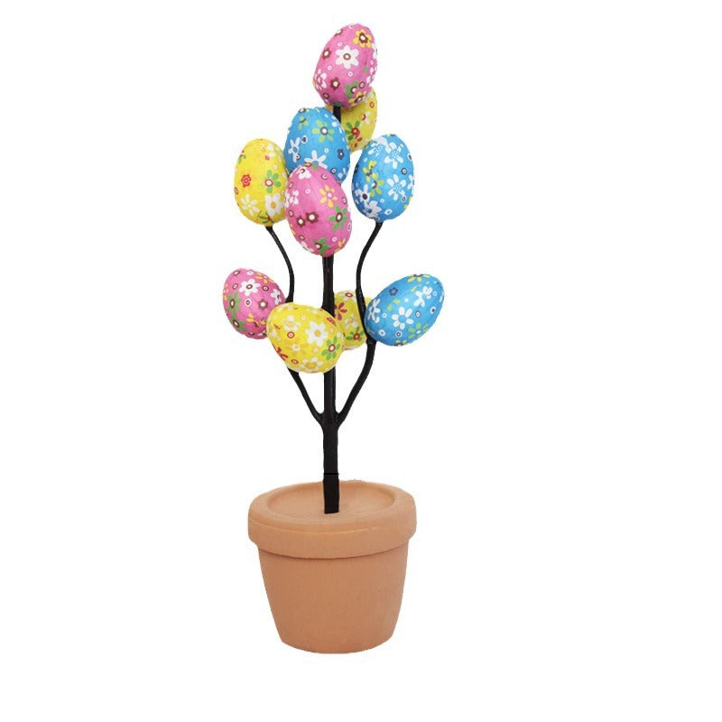 Dekorativer Blumentopf mit bunten Eierblüten Brehn