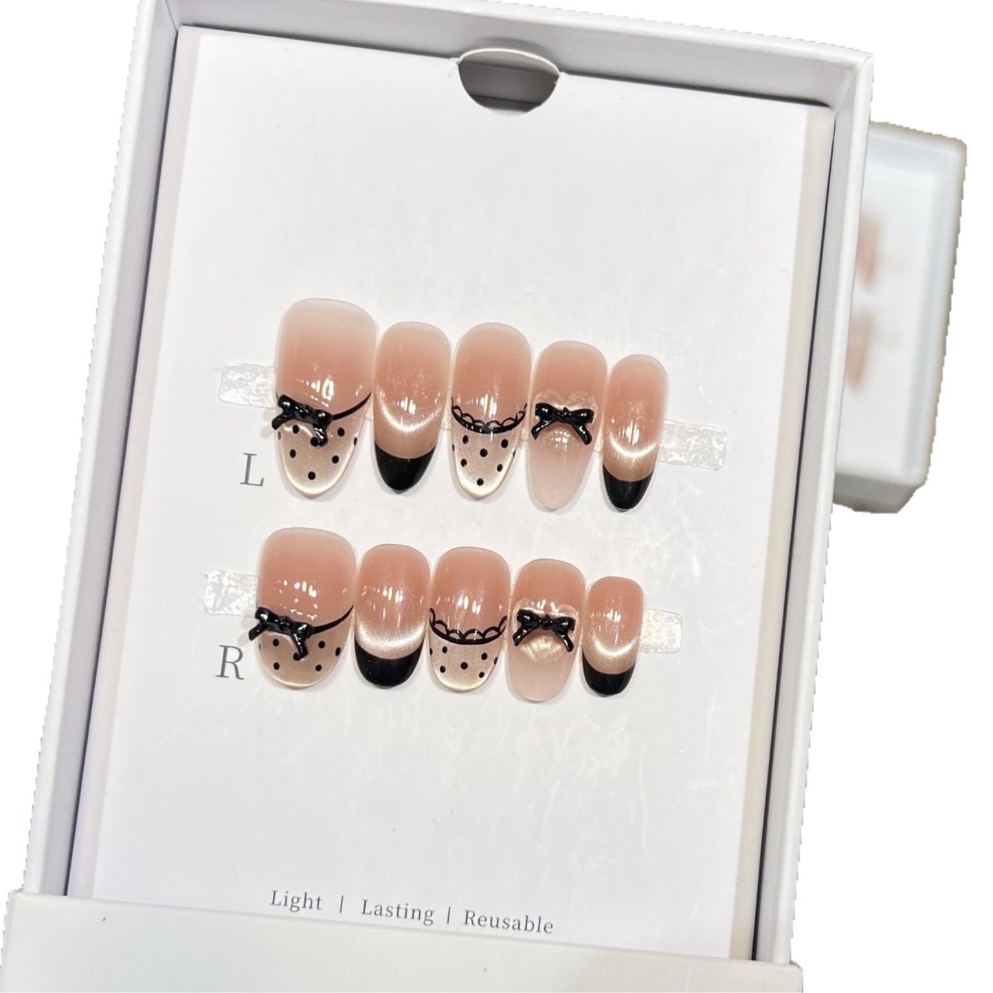 Elegantes wiederverwendbares Press-On-Nail-Art-Set mit charmanten Schleifenakzenten Brehn
