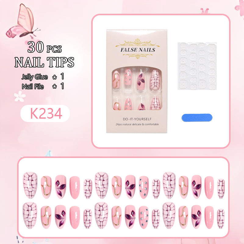 Kunstnagelset mit glamourösem Design und funkelnden Akzenten Brehn