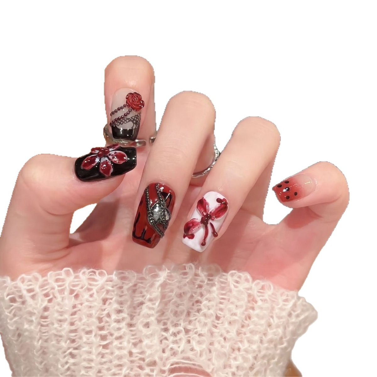 Künstlerisches Nagelschmuck Press-On Set mit einzigartigen floralen und Edelsteindesigns Brehn