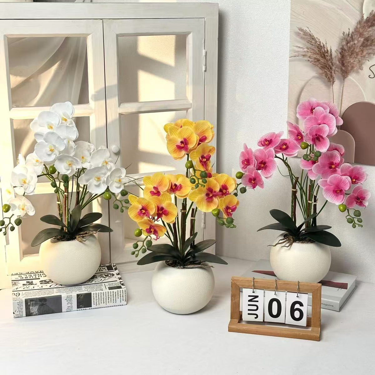 Elegante künstliche Orchideenpflanzenarrangement für die Wohnkultur