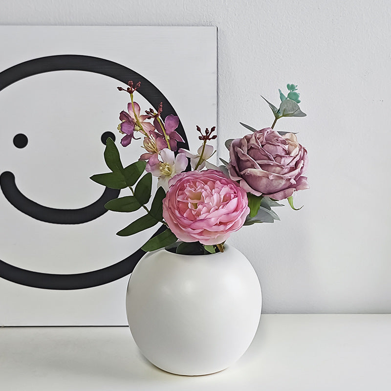 Minimalistische runde Keramik-Pflanzgefäß