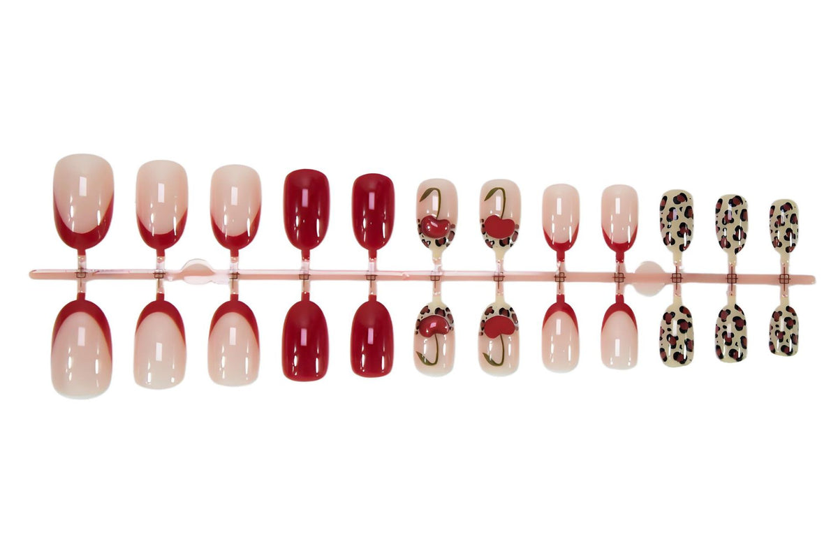 Kunstnagelset mit trendigen Leopard- und Kirschmotiven Brehn