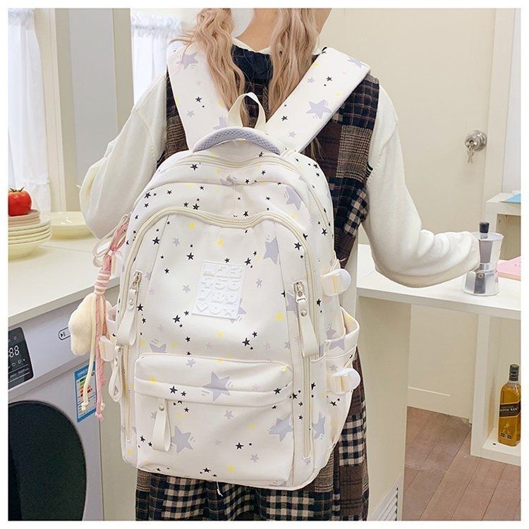 Verspielter Rucksack mit Sternenmotiven und Praktischen Funktionen Brehn