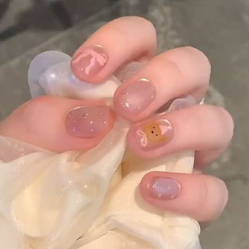 Künstlerisches Press-On Nagelset mit süßem Figurenmotiv Brehn