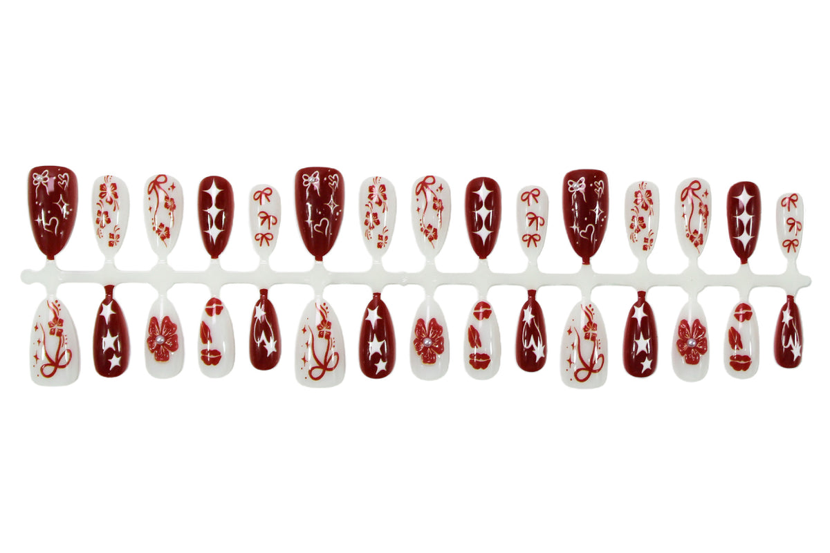 Kunstnagelset mit romantischen Herz- und Blütenmotiven Brehn