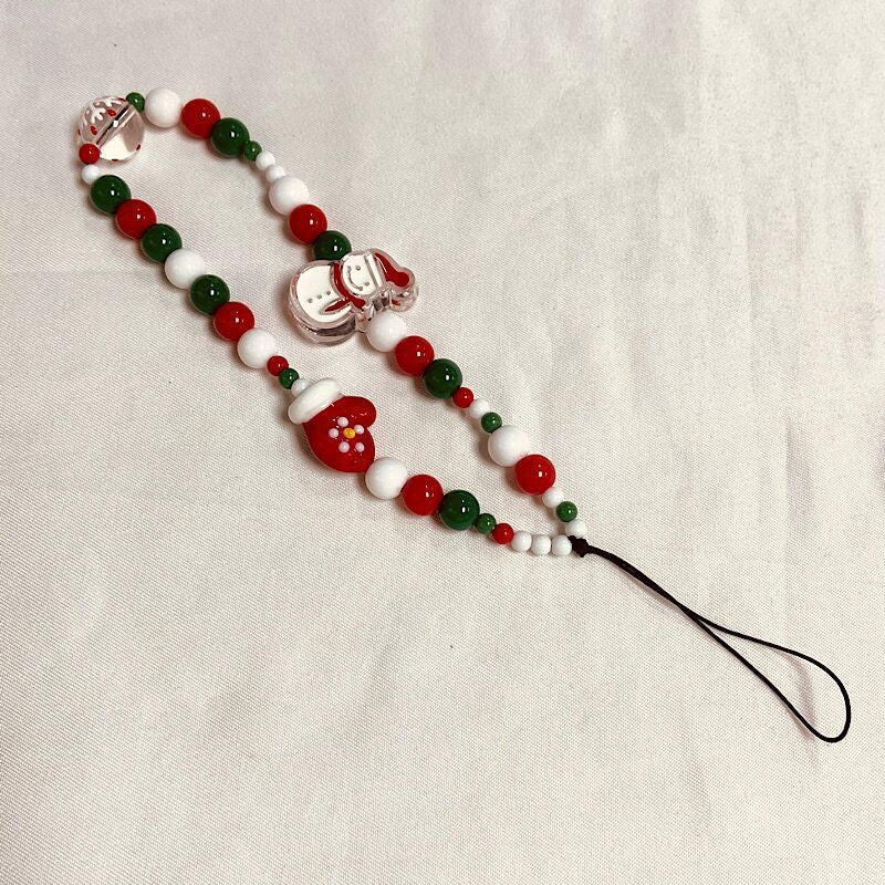 Festliches Perlen Charm Handyband Brehn