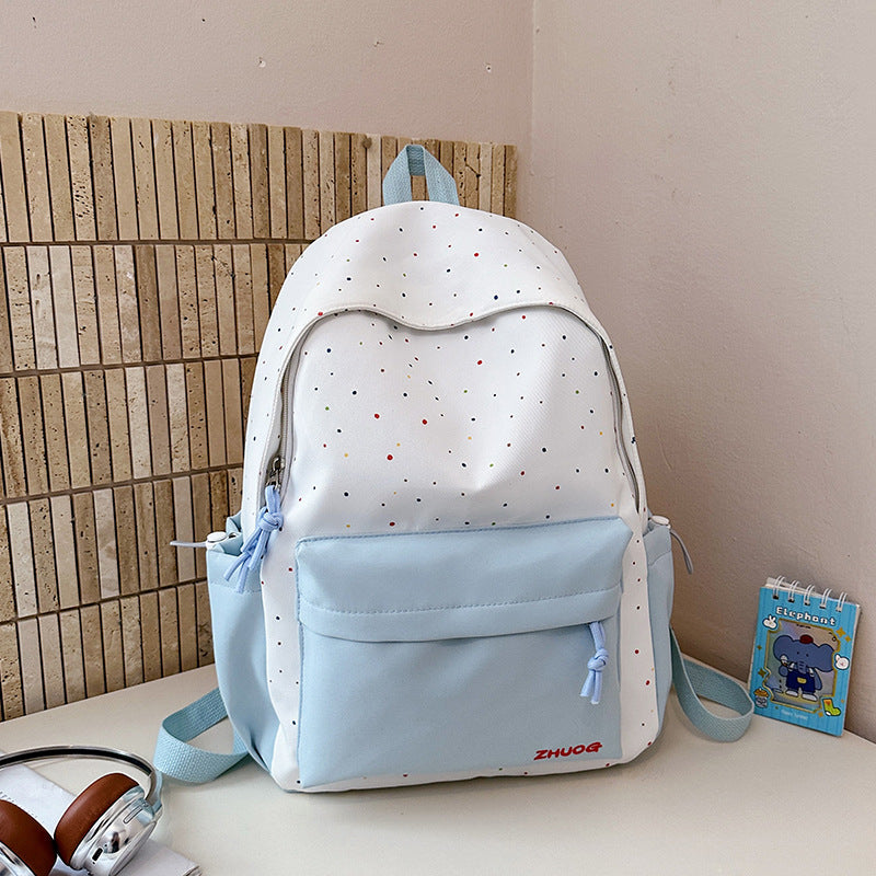 Lustiger gepunkteter Schulrucksack