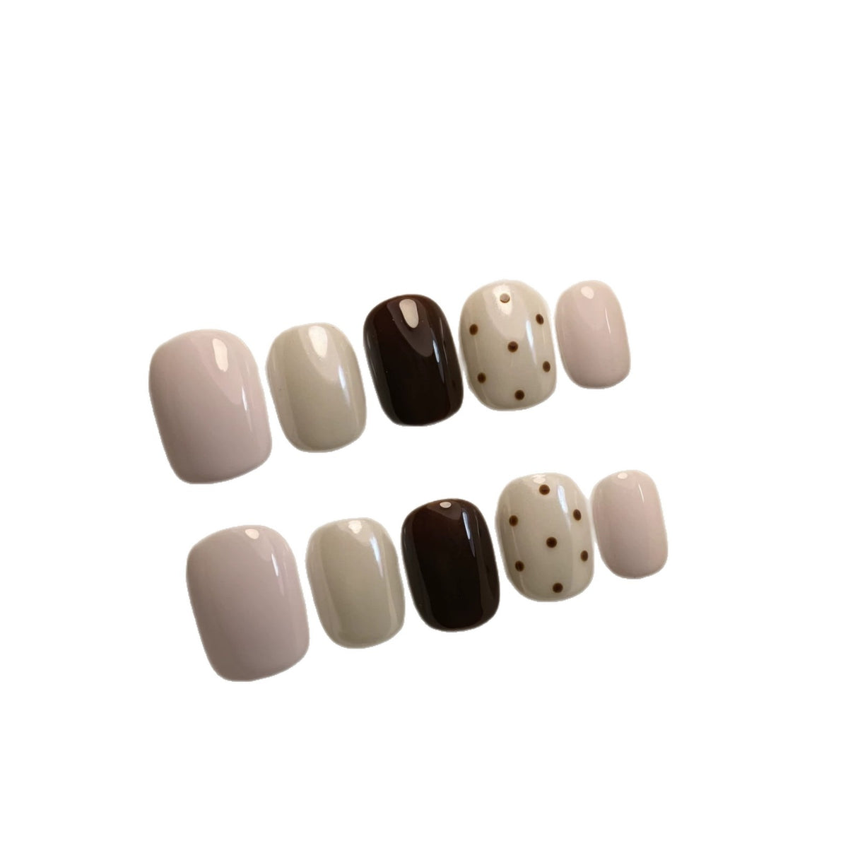 Künstlerisches Press-On-Nagelset mit abstrakten und Punktmuster-Designs