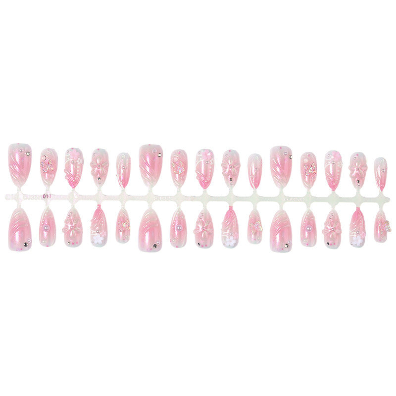 Kunstnagelset mit elegantem Blumendesign und Glitzernoten Brehn