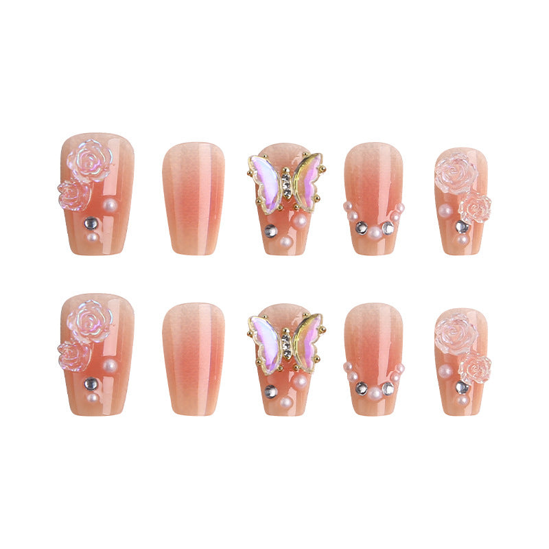 Kunstnagelset mit filigranen 3D-Blüten und strahlenden Glitzerakzenten Brehn