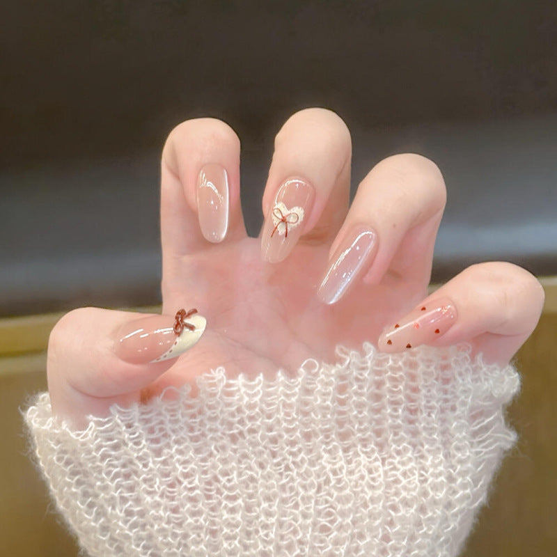 Dekorative Nagelkunst Tipps mit Schleifenakzenten Brehn