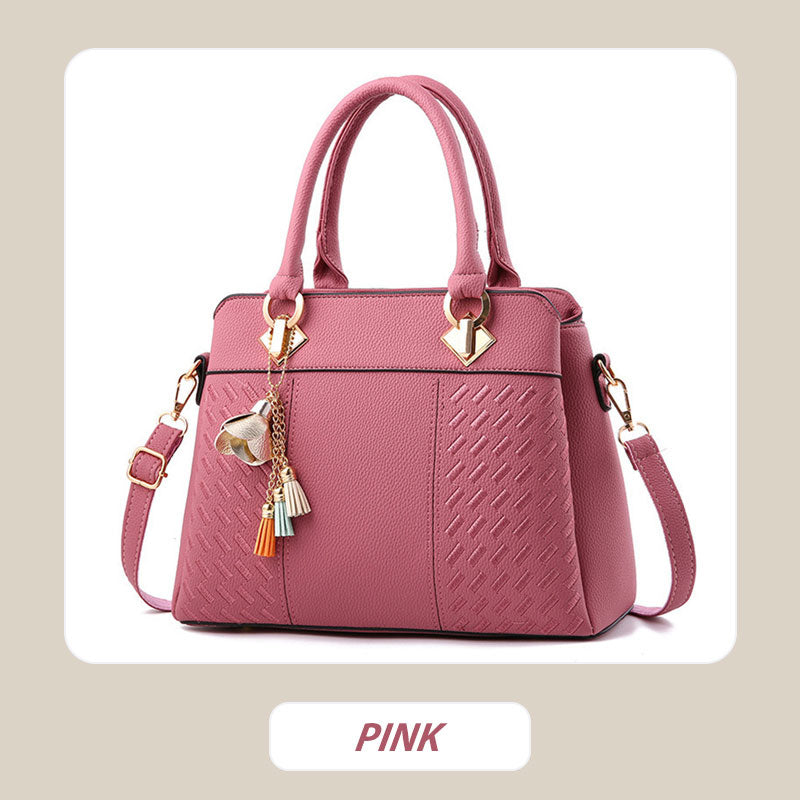 Elegante Damenhandtasche mit Quastenanhänger