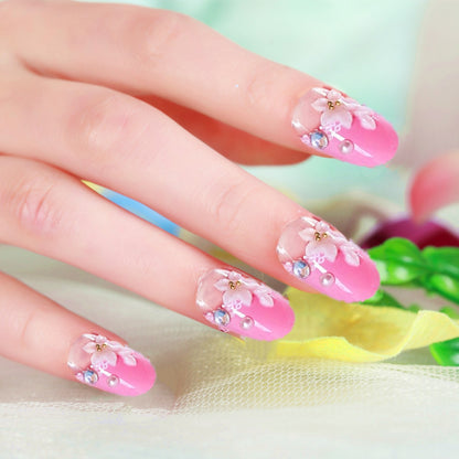 Blumenverzierte Press-On Nagelkunst