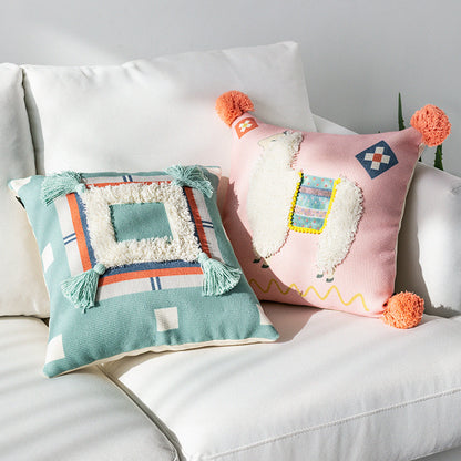 Quadratischer Kissenbezug mit 3D-Alpaka‑Applikation, Bouclé‑Patch und Bommel‑Ecken Brehn