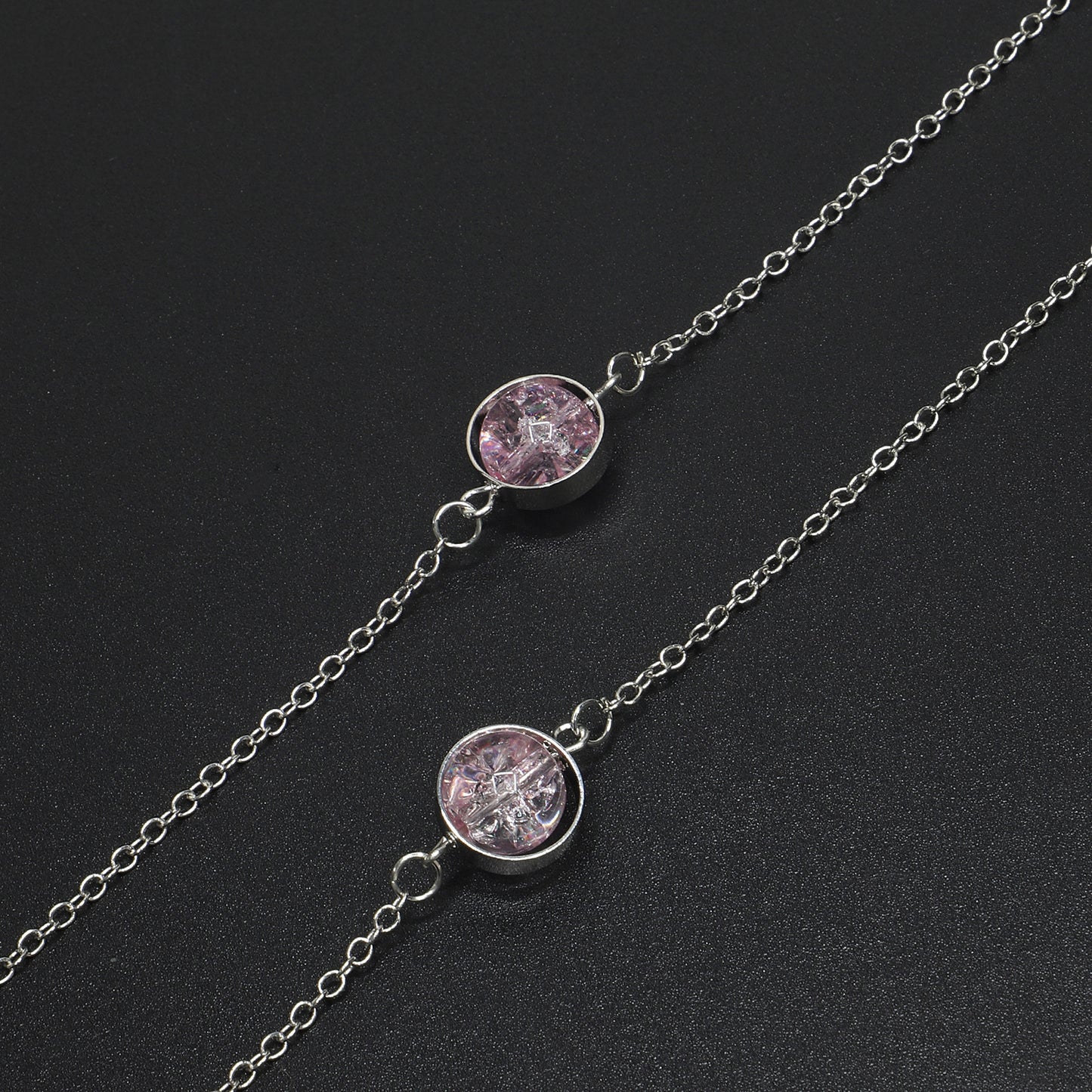 Luxuriöser, mit Perlen besetzter Brillenhalter Brehn