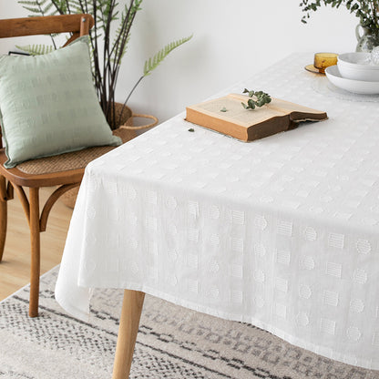 Tischdecke aus Baumwollmix mit geprägtem Quadrat‑ und Kreisrelief Brehn