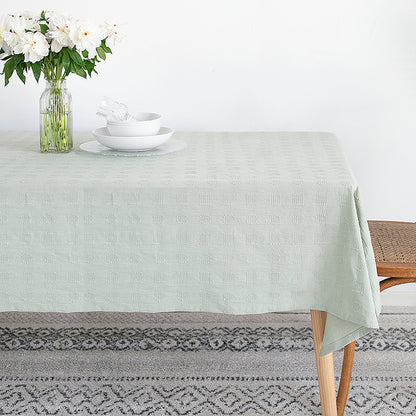 Tischdecke aus Baumwollmix mit geprägtem Quadrat‑ und Kreisrelief Brehn