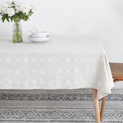 Tischdecke aus Baumwollmix mit geprägtem Quadrat‑ und Kreisrelief Brehn