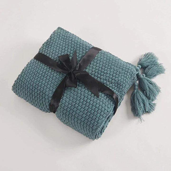 Brehn | Gestrickte Wolldecke mit Quasten - NordicCozy