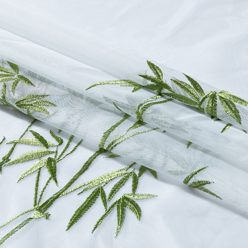 Gardine mit Ösen aus halbtransparentem Voile, besticktem Bambusmotiv und gesäumtem Zierrand Brehn