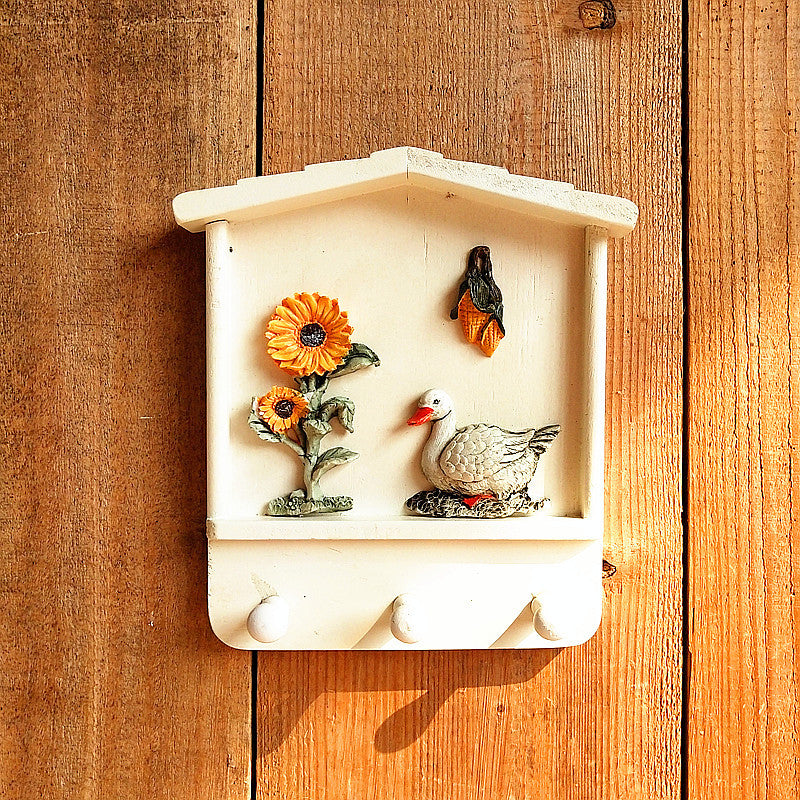 Dekorativer Wandhaken mit Blumenmuster
