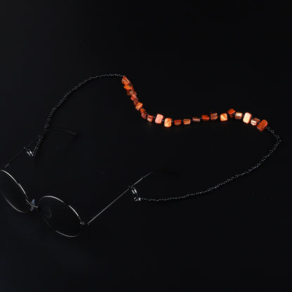 Perlenbrillenhalter mit natürlichen Muschelakzenten Brehn