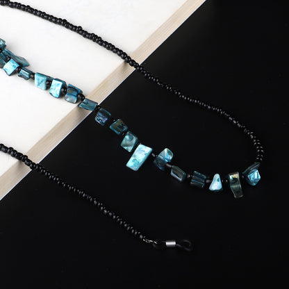 Perlenbrillenhalter mit natürlichen Muschelakzenten Brehn