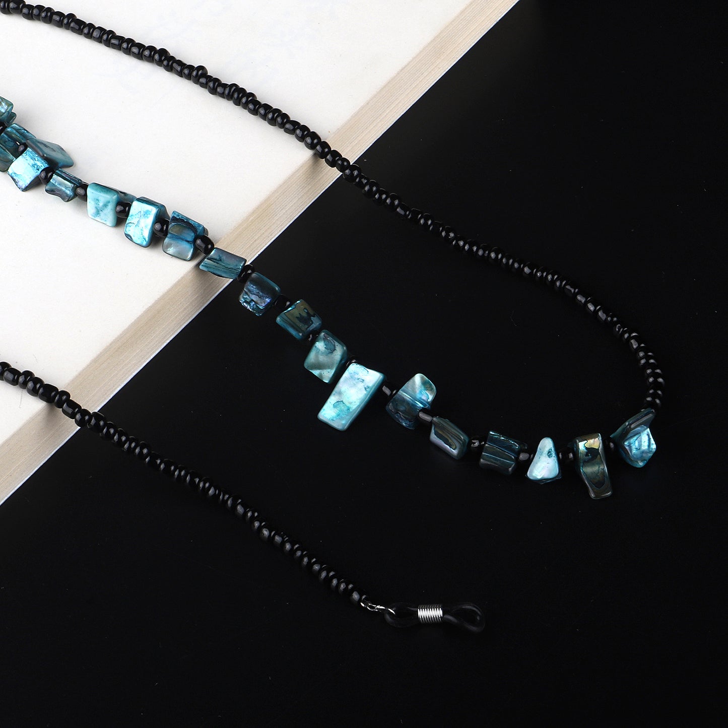 Perlenbrillenhalter mit natürlichen Muschelakzenten Brehn