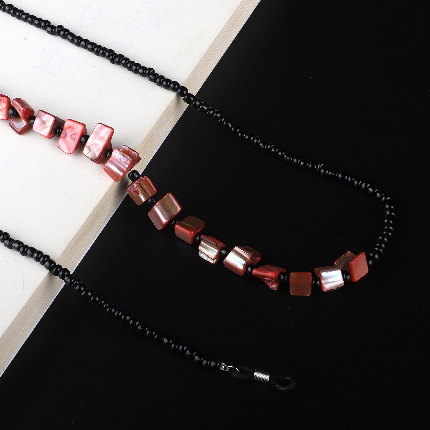 Perlenbrillenhalter mit natürlichen Muschelakzenten Brehn