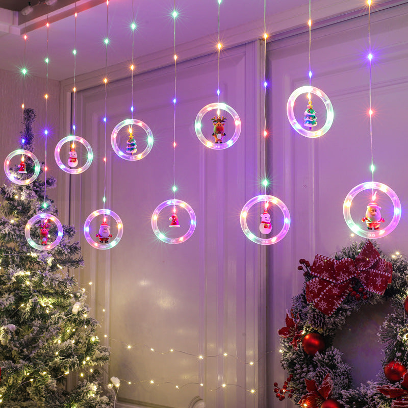 LED-Lichtervorhang mit weihnachtlichen Motiven