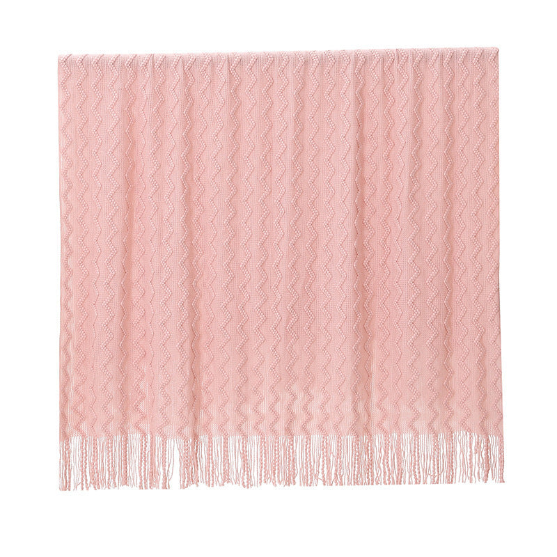 Gestrickte Sofadecke mit Wellenmuster