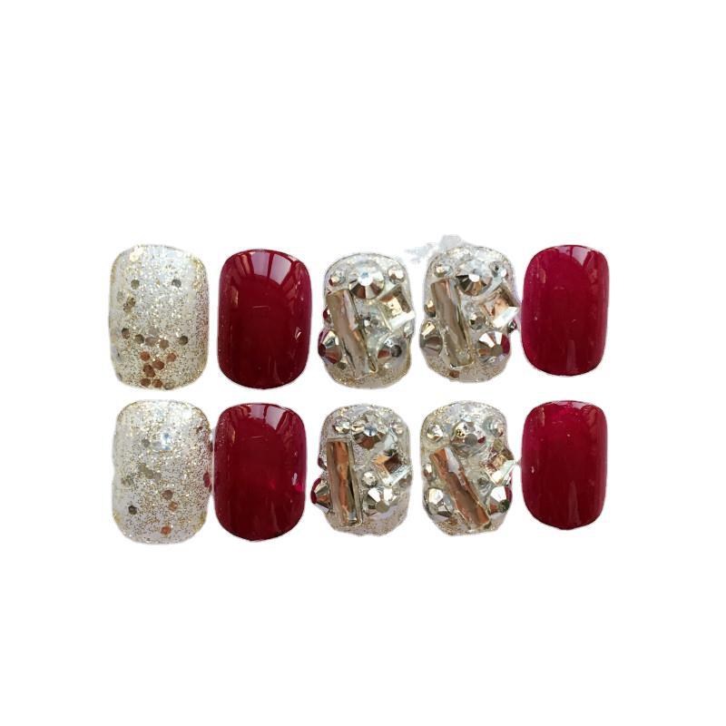 Kunstnägel mit luxuriöser Glitter- und Blumendesign Brehn