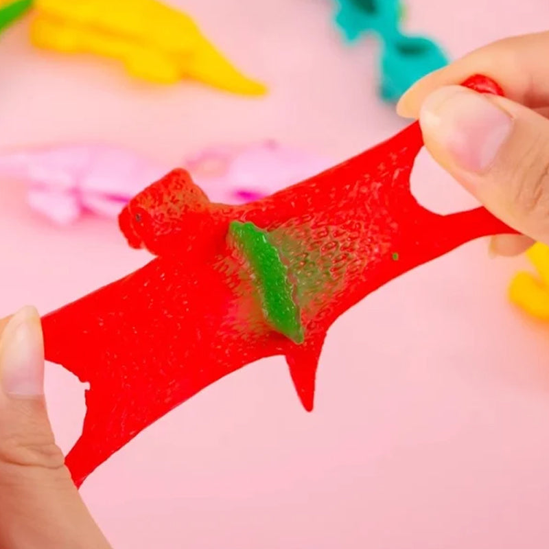 Slingshot Dinosaurier Spielzeuge (Farben zufällig) | Brehn
