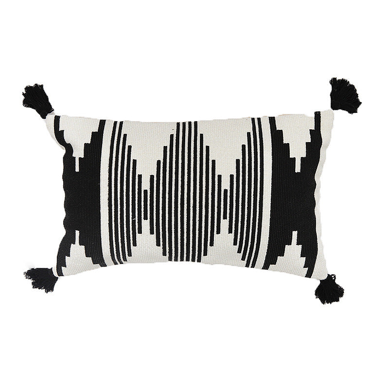 Rechteckiger Jacquard-Lumbarkissenbezug mit geometrischem Ethno-Relief und dekorativen Quasten Brehn