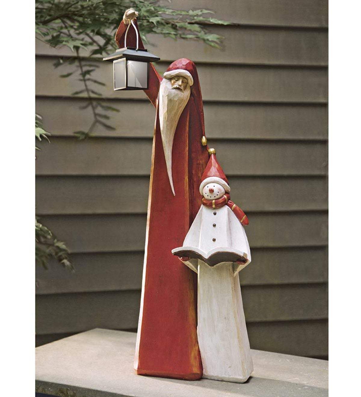 Weihnachtsmann- und Schneemann-Skulptur