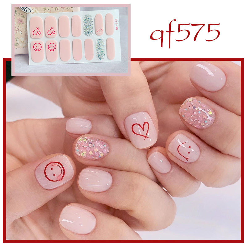 Künstliche Nagelkunst mit Smileys und Herzen Brehn