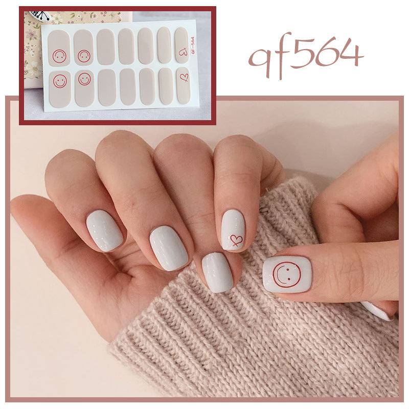 Künstliche Nagelkunst mit Smileys und Herzen Brehn