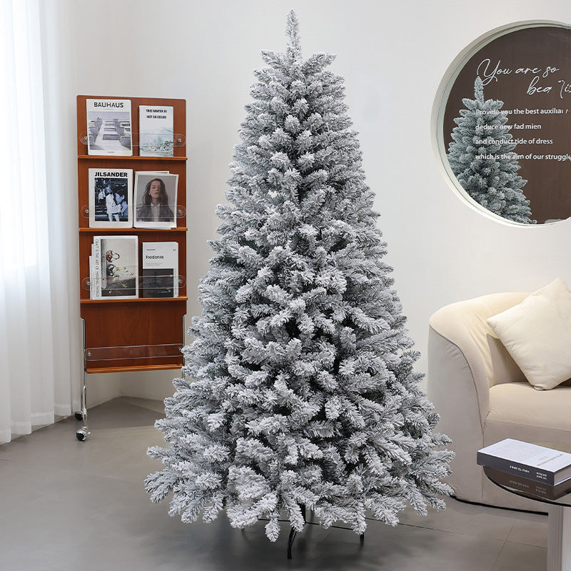 Künstlicher Weihnachtsbaum mit Schnee-Effekt