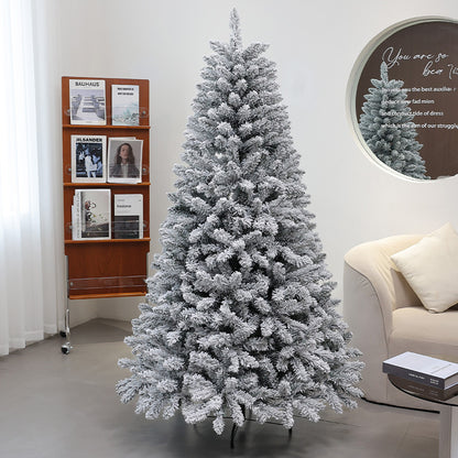 Künstlicher Weihnachtsbaum mit Schnee-Effekt